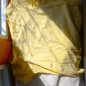 Yellow shirt that says smile